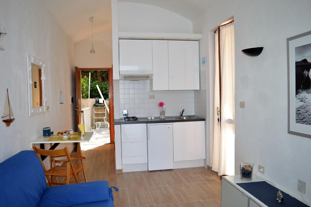 House Grecale Apartment Монеглия Стая снимка